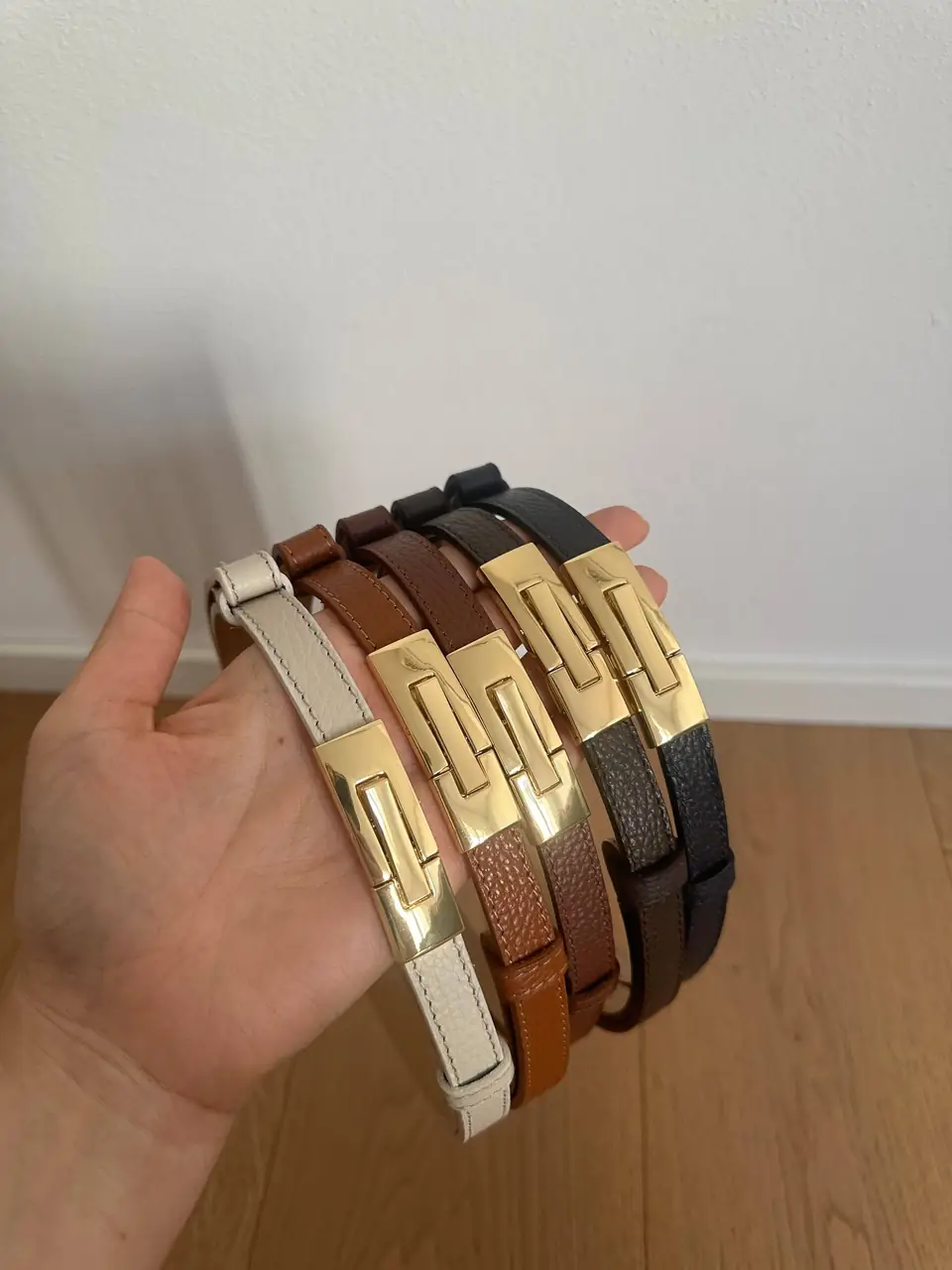 Skinny belts in cream, cognac, brown and black, gold buckles