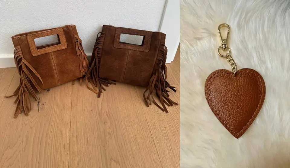 Cognac and brown mini fringe bags next to a cognac leather heart charm
